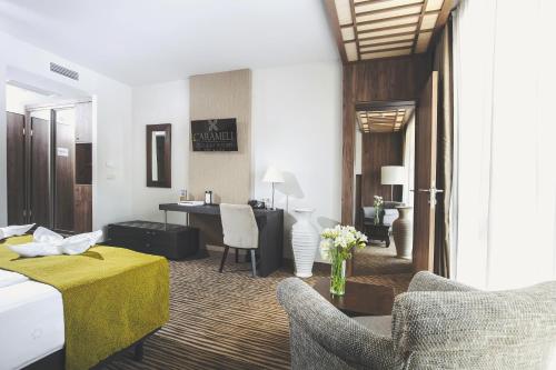 Postel nebo postele na pokoji v ubytování Caramell Premium Resort Superior