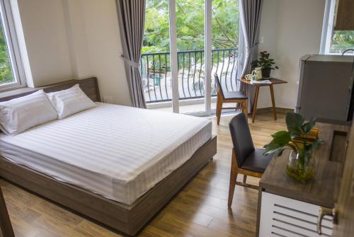 Ένα ή περισσότερα κρεβάτια σε δωμάτιο στο Spring Light Home
