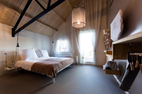 Postel nebo postele na pokoji v ubytování Design Hotel Modez