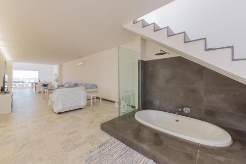 Postel nebo postele na pokoji v ubytování Villa Unica Terrazzo Sul Mare