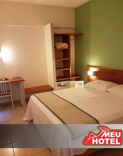 Ένα ή περισσότερα κρεβάτια σε δωμάτιο στο Meu Hotel Garça