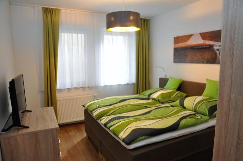 Katil atau katil-katil dalam bilik di Apartment an den Quellen