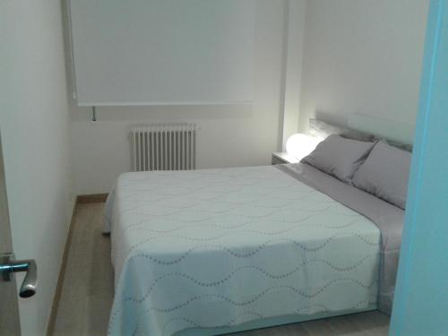 Postel nebo postele na pokoji v ubytování Apartamento Avenida Portugal-Espolon