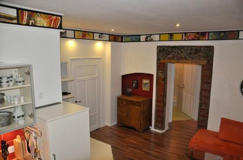 a room with a kitchen and a living room at Ferienwohnung Lienz Egger in Lienz