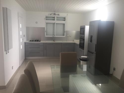 Η κουζίνα ή μικρή κουζίνα στο Villa Fleur de Canne