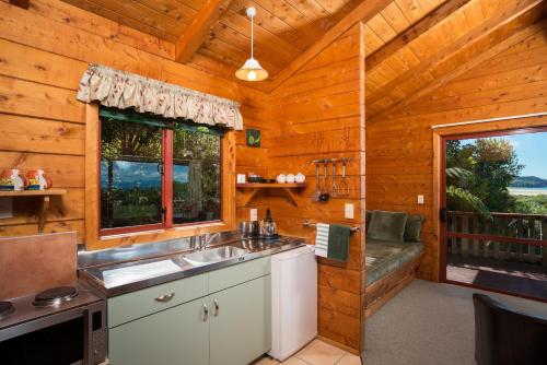 A kitchen or kitchenette at Ocean View Chalets