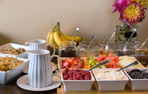 a table with a bunch of different types of fruit at Blue Lake Ranch in Hesperus