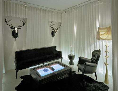 a living room with a couch and a chair at DELUXE APARTMENTS - free parking in Drama