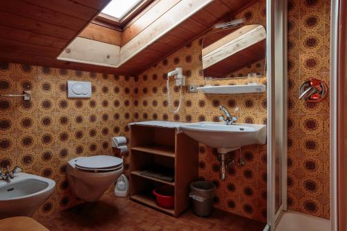 Vonios kambarys apgyvendinimo įstaigoje Holiday Apartments Costanzi