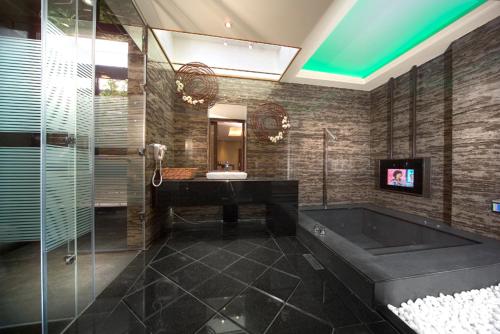 Un baño de Yen Jim Boutique Motel
