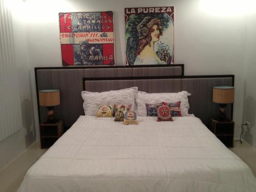 Voodi või voodid majutusasutuse Tumon Bel-Air Serviced Residence toas