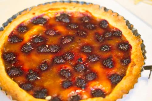 a blackberry pie sitting on top of a table at Locanda Zita in Sestola