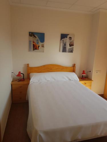 Postel nebo postele na pokoji v ubytování Casa Esquilador