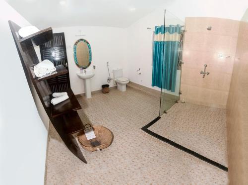 Et badeværelse på The Village Resort Palolem