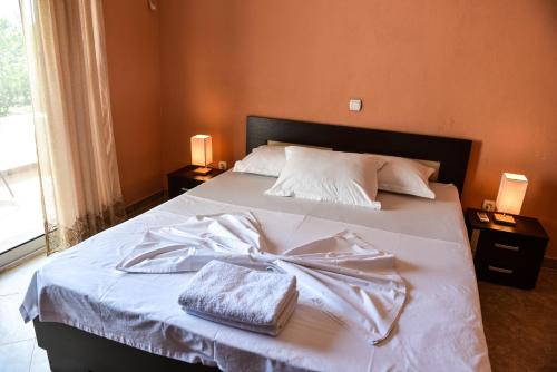 Ένα ή περισσότερα κρεβάτια σε δωμάτιο στο Sunrise house apartments