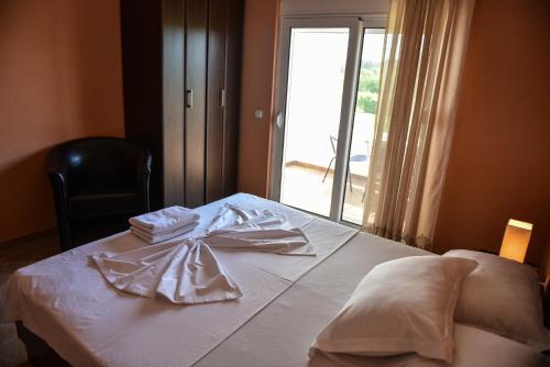 Ένα ή περισσότερα κρεβάτια σε δωμάτιο στο Sunrise house apartments