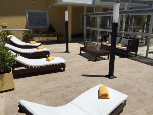 Ruang duduk di Dos Mareas Apart Piscina Climatizada Cubierta