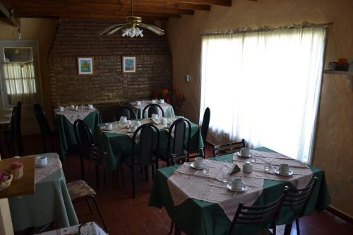 En restaurant eller et andet spisested på Alfil Apartamentos Villa Gesell