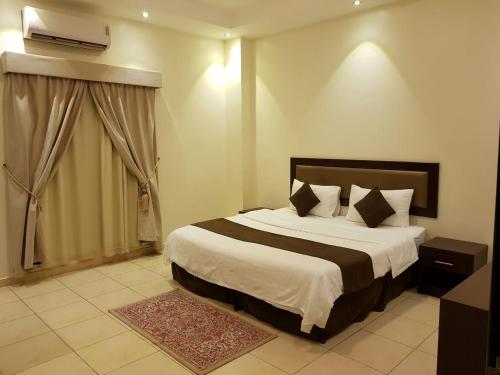 Voodi või voodid majutusasutuse Samaya Royal Afif toas