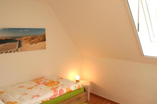 Säng eller sängar i ett rum på Appartement Neusiedl am See mit Dachterrasse