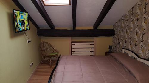 Ένα ή περισσότερα κρεβάτια σε δωμάτιο στο B&B Casa Arcangeli