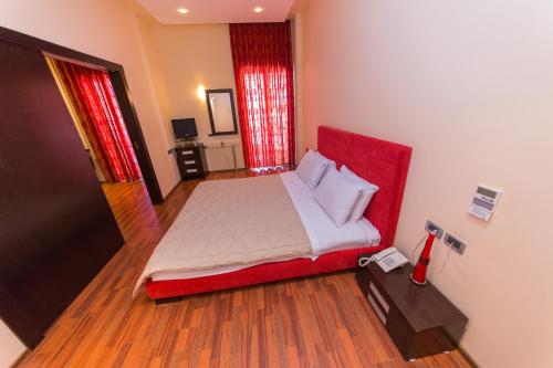 Postel nebo postele na pokoji v ubytování Hotel Brilant Saranda
