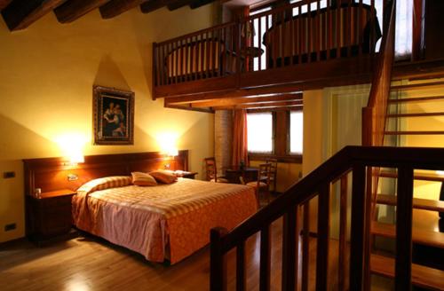 Säng eller sängar i ett rum på Barchessa Contarini