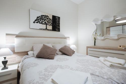 Postel nebo postele na pokoji v ubytování Luxury Apartment Peñuelas Free Parking