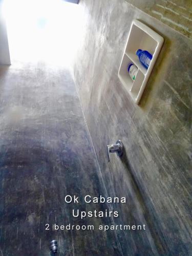 a bathroom with a shower and a sink in a room at Ok Cabana Negombo in Negombo