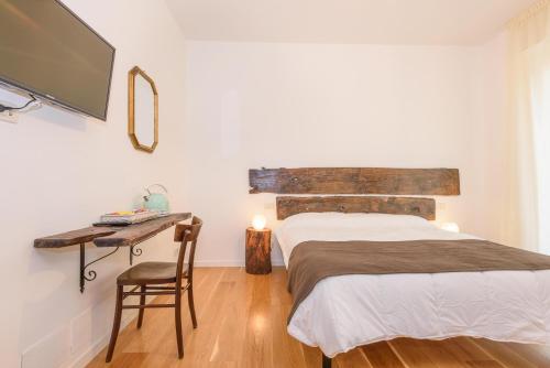 Katil atau katil-katil dalam bilik di Maison Al Parco