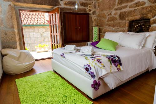 Postel nebo postele na pokoji v ubytování Casa Rautau