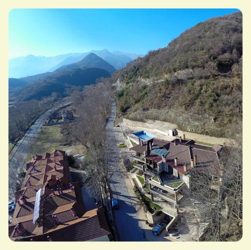 an aerial view of a house on a mountain at Nymfes Hotel in Kato Loutraki