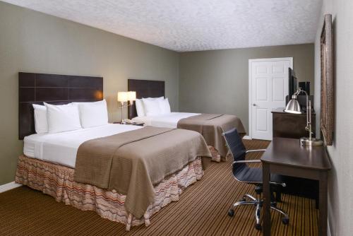 Lova arba lovos apgyvendinimo įstaigoje Americas Best Value Inn & Suites Waller/Prairie View