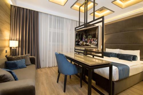 Letto o letti in una camera di Eden Luxury Suites Terazije
