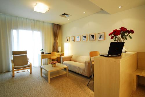 Khu vực ghế ngồi tại Traveler Inn Gusu Suzhou