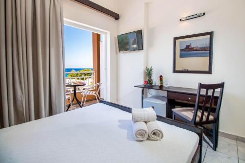Postel nebo postele na pokoji v ubytování Filmar Hotel, Ixia, Rhodes