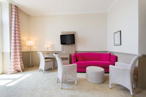 Гостиная зона в Hôtel Vacances Bleues Royal Westminster