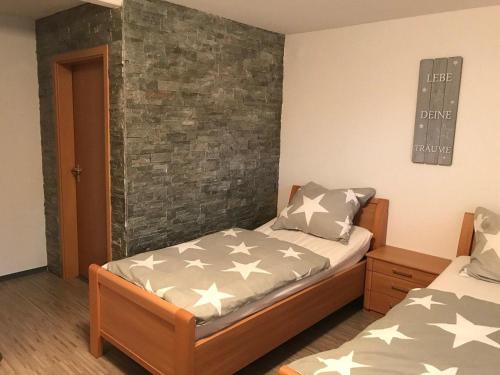Postel nebo postele na pokoji v ubytování Ferienwohnung - Kurz