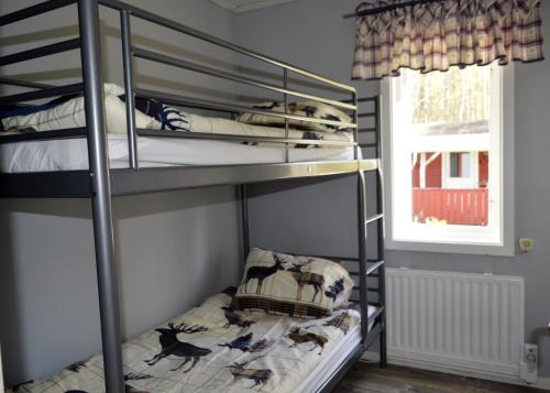 Postel nebo postele na pokoji v ubytování K45 Mackenzie Cottage