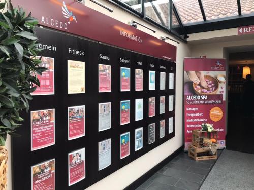 a display of signs on a wall in a store at AUSZEIT Hotel in Levenhagen