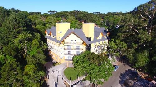 an overhead view of a large house in the forest at Sky Serra Hotel in Gramado
