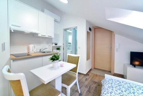 Dapur atau dapur kecil di Piccolo Apartments