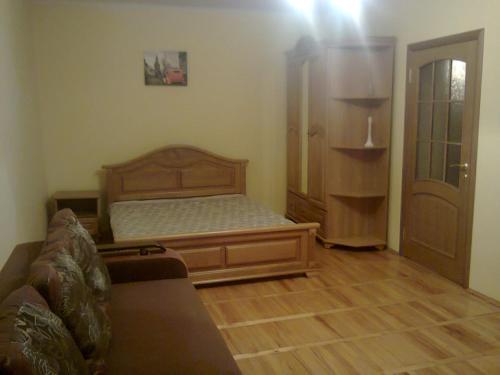 Кровать или кровати в номере Apartment with Balcony