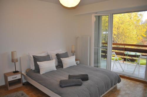Ein Bett oder Betten in einem Zimmer der Unterkunft Apartment Leysin - Swiss Alps - Fully Renovated !