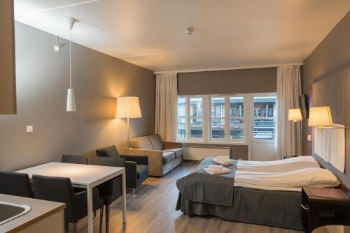 Postel nebo postele na pokoji v ubytování Oppdal Gjestetun Hotell
