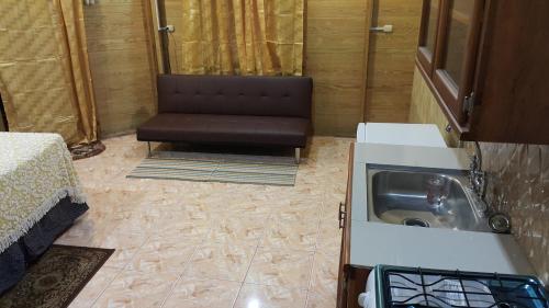 Zona d'estar a Cottage Mango