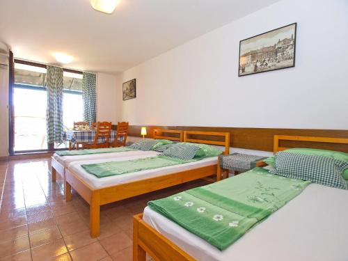 Posteľ alebo postele v izbe v ubytovaní Apartment Stipe 1444