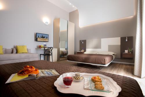 A bed or beds in a room at B&B In Centro Palermo