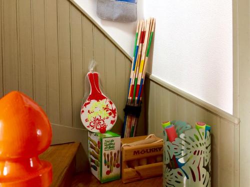 a vase sitting on a table next to some chopsticks at Glaz Ocean in Douarnenez