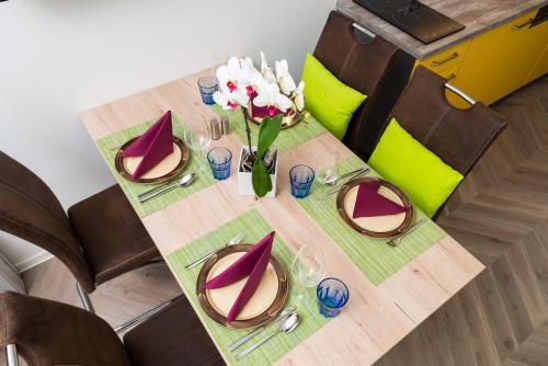 a table that has some plates of food on it at Apartments Villa Luna in Vienna